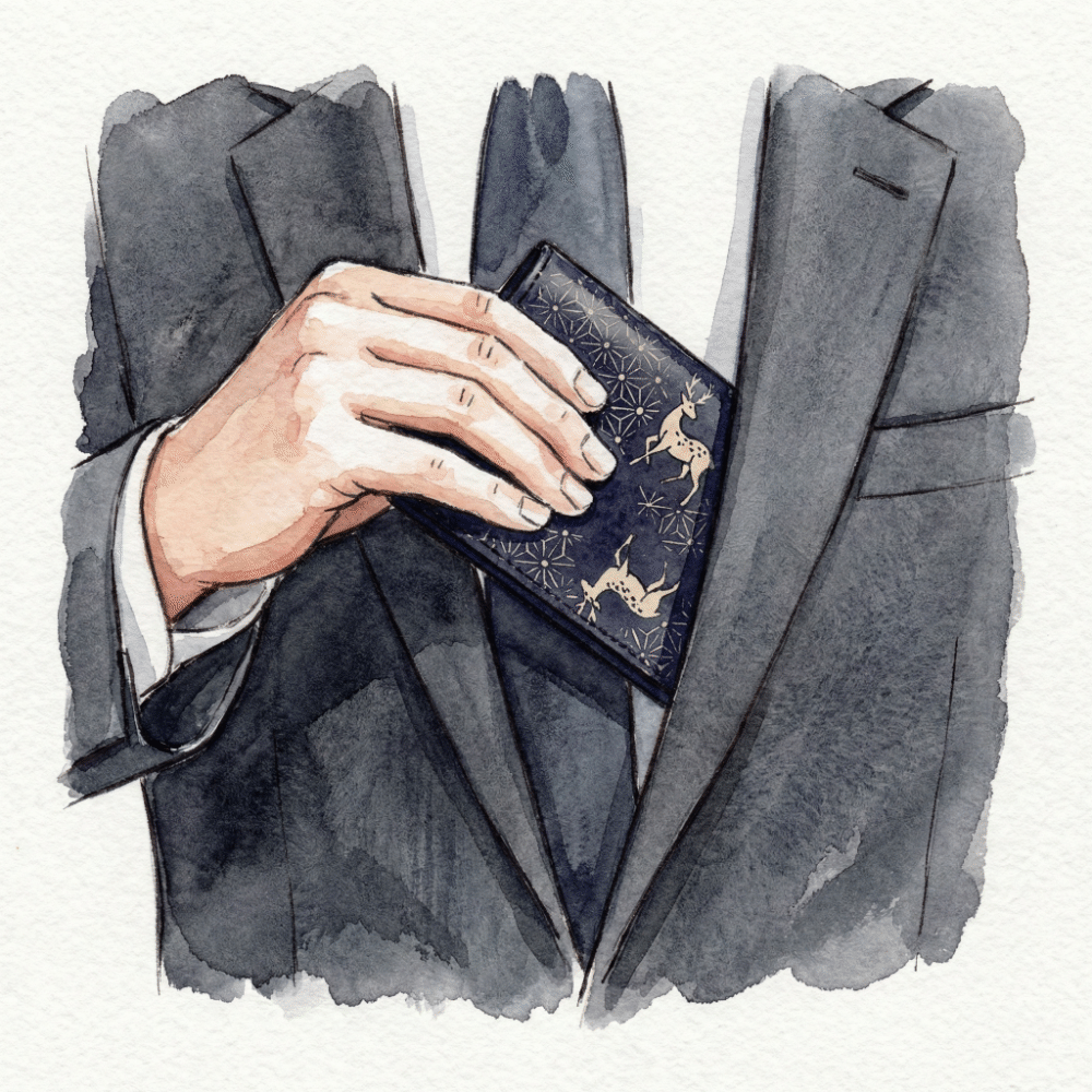 Illustration of a man drawing a slim inden long wallet from a suit's breast pocket — emphasizing how little it disturbs the silhouette