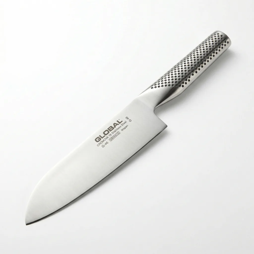 GLOBAL G-46 santoku knife showing the signature seamless all-stainless construction and dimpled handle design