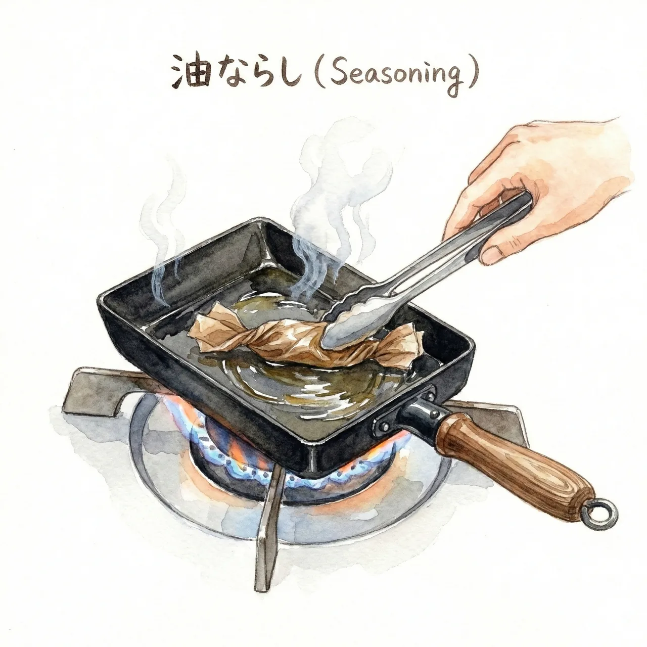 Oil return technique for tamagoyaki pan: coat surface with oil then remove excess