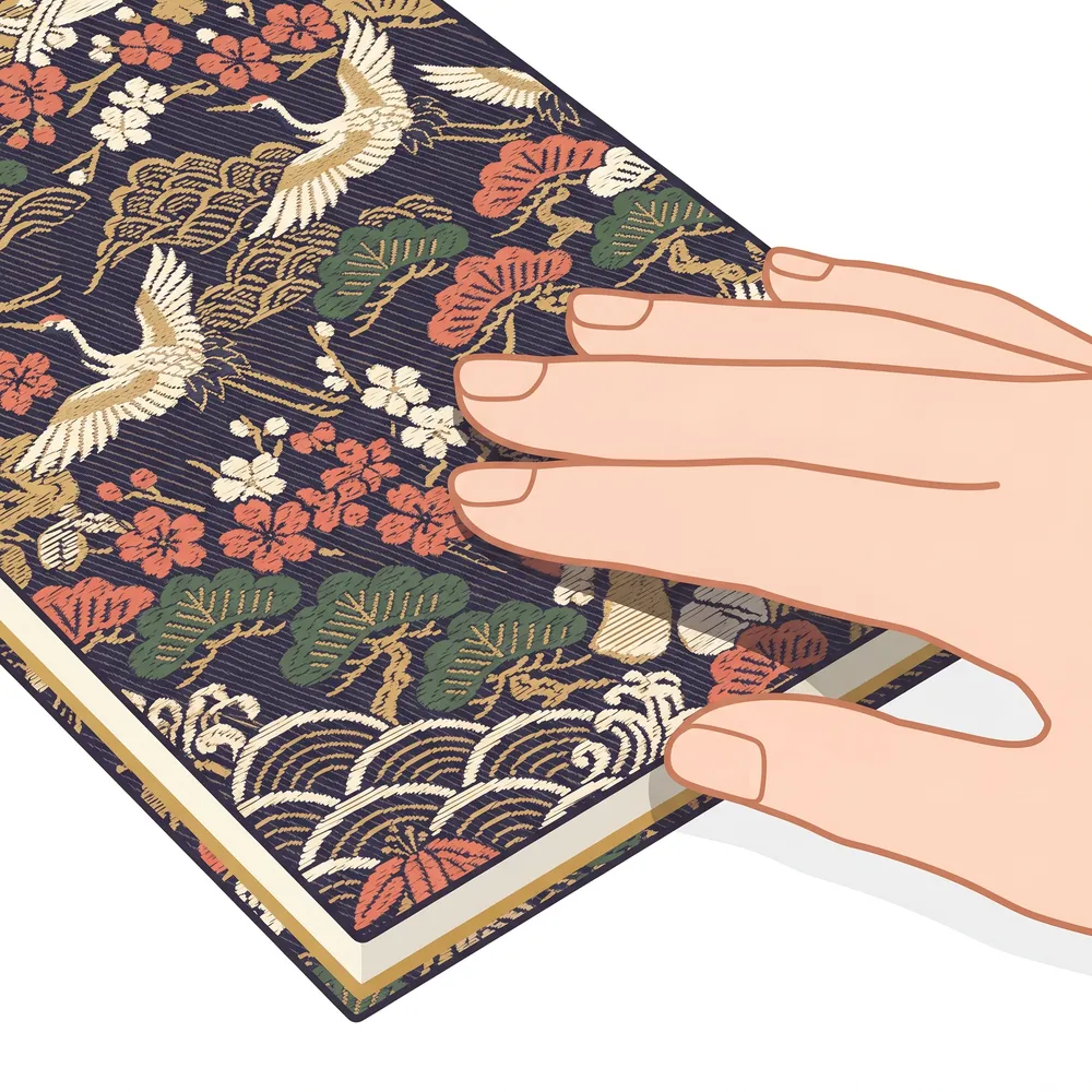 西陣織の美しい表紙に触れる手のイラスト